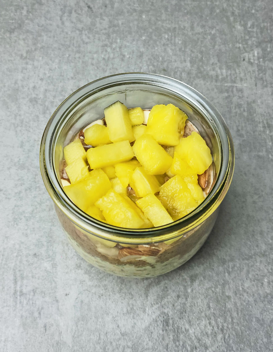 Golden Hour Overnight Oats adding pineapple