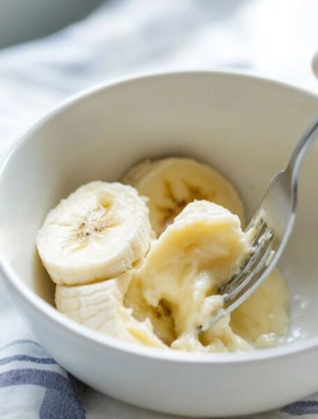 Mashing the ripe bananas