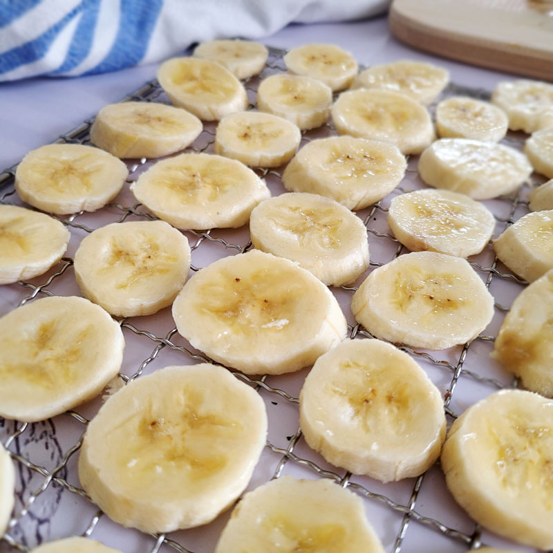 slice bananas and place them on dehydrator rack